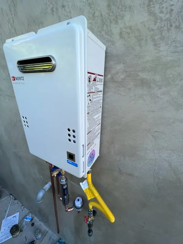 Tankless water heater installation for Academy homes
